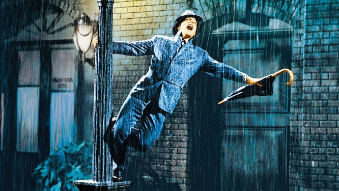 Gene Kelly em cena do filme 'Cantando na chuva' Foto: Reprodução