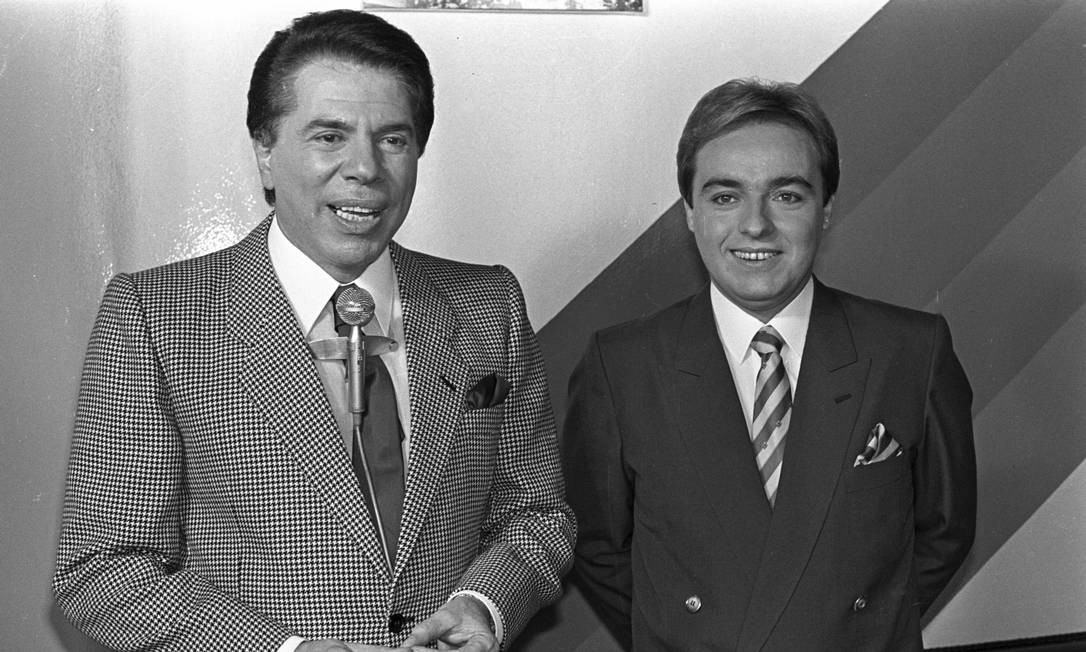 Silvio Santos e Gugu Liberato em registro do 'Programa Silvio Santos', em 1988 Foto: Arquivo O Globo / Agência O Globo