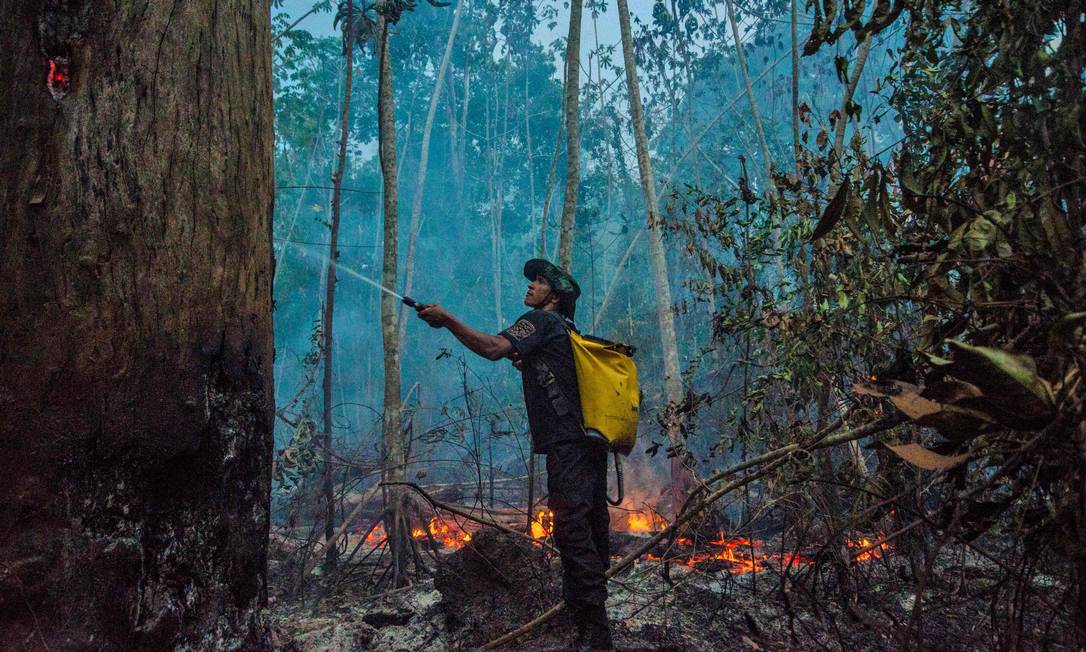 As queimadas na Amazônia e, mais recentemente, no Pantanal, tendem a afastar os investidores estrangeiros do Brasil Foto: João Paulo Guimarães / AFP