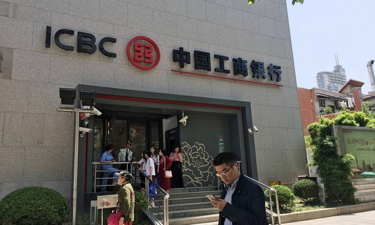 O ICBC Bank (banco industrial e comercial da China) , orfez sua oferta de ações em 2006 e captou US$ 21,9 bilhões Foto: Reprodução