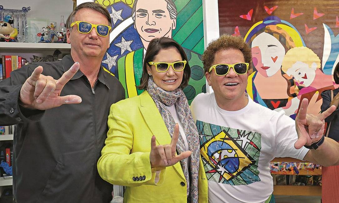 Bolsonaro, Michelle e Romero Britto no ateliê do artista, em Miami. Foto: Alan Santos / PR