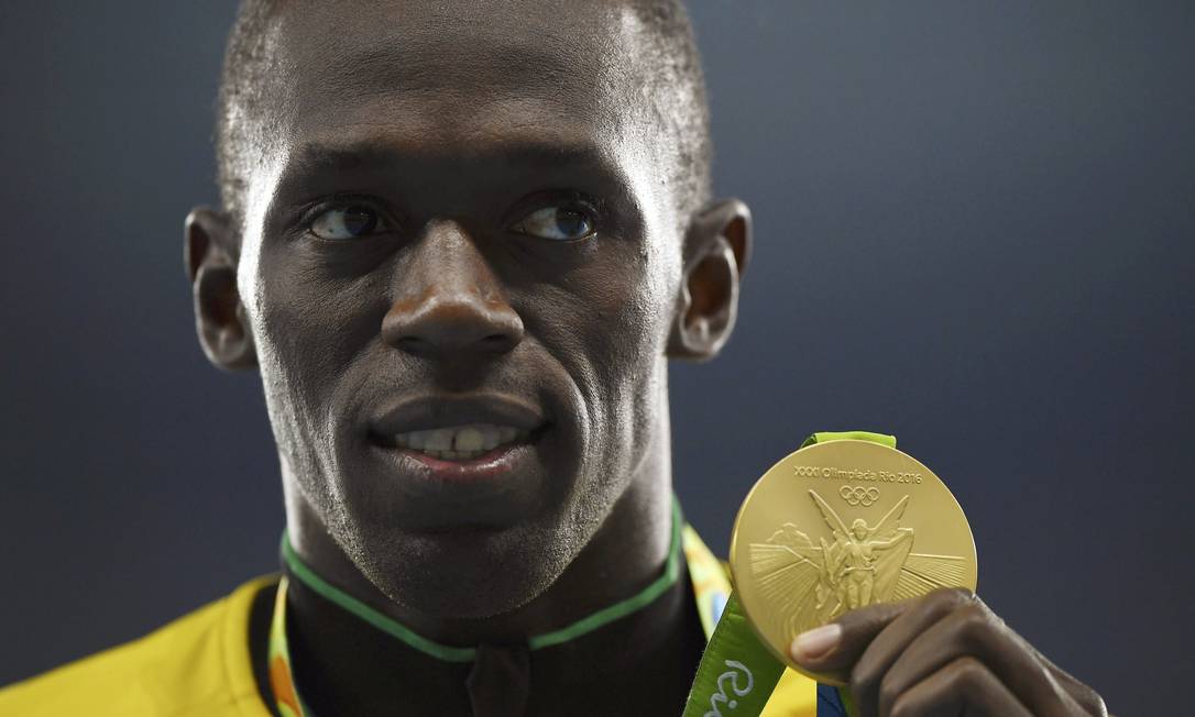 A fé católica de Usain Bolt e a medalha milagrosa que ele não larga