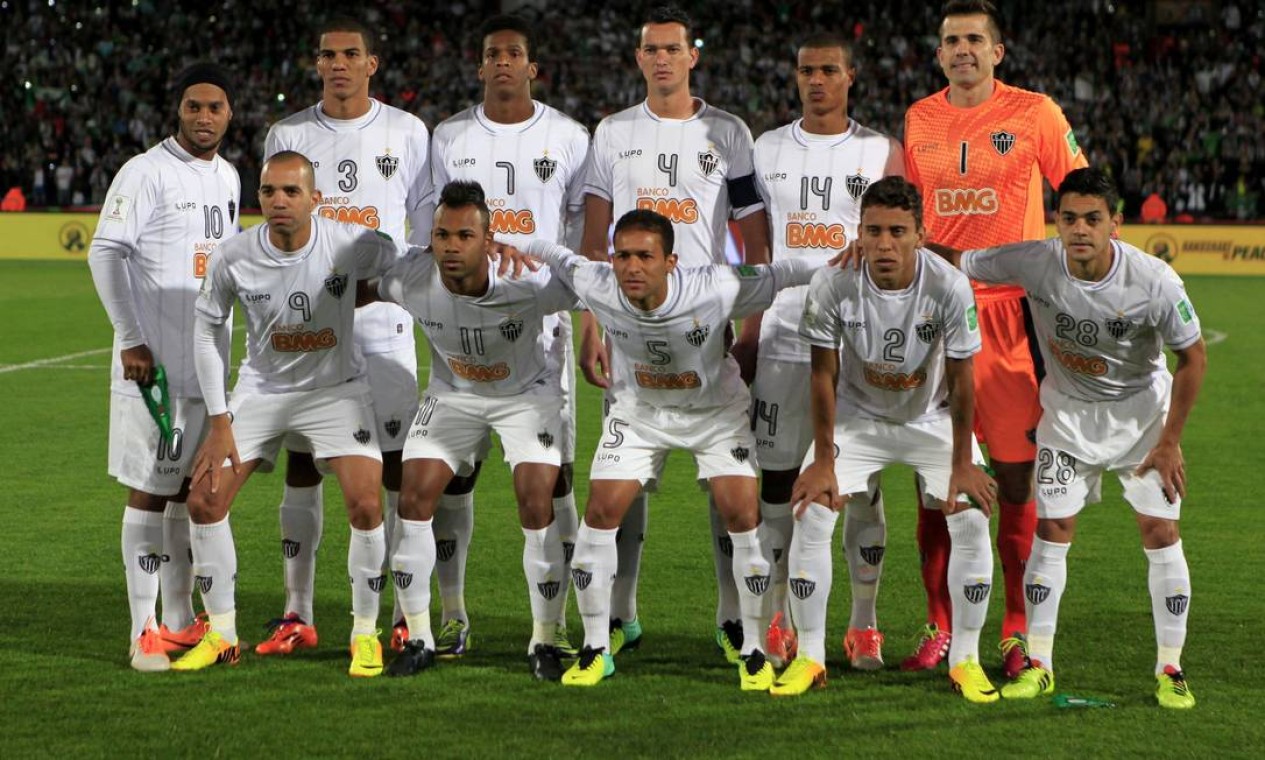 Atletico Mineiro's players line up for a team photograph before their FIFA Club World Cup semi-final soccer match against Raja Casablanca at Marrakech stadium December 18, 2013. REUTERS/Amr Abdallah Dalsh (MOROCCO - Tags: SPORT SOCCER) Foto: AMR ABDALLAH DALSH / REUTERS