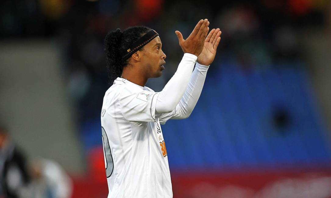 Ronaldinho of Brazil's Atletico Mineiro celebrates after scoring a goal during their 2013 FIFA Club World Cup third place soccer match against China's Guangzhou Evergrande in Marrakech stadium, December 21, 2013. REUTERS/Louafi Larbi (MOROCCO - Tags: SPORT SOCCER) Foto: LOUAFI LARBI / REUTERS