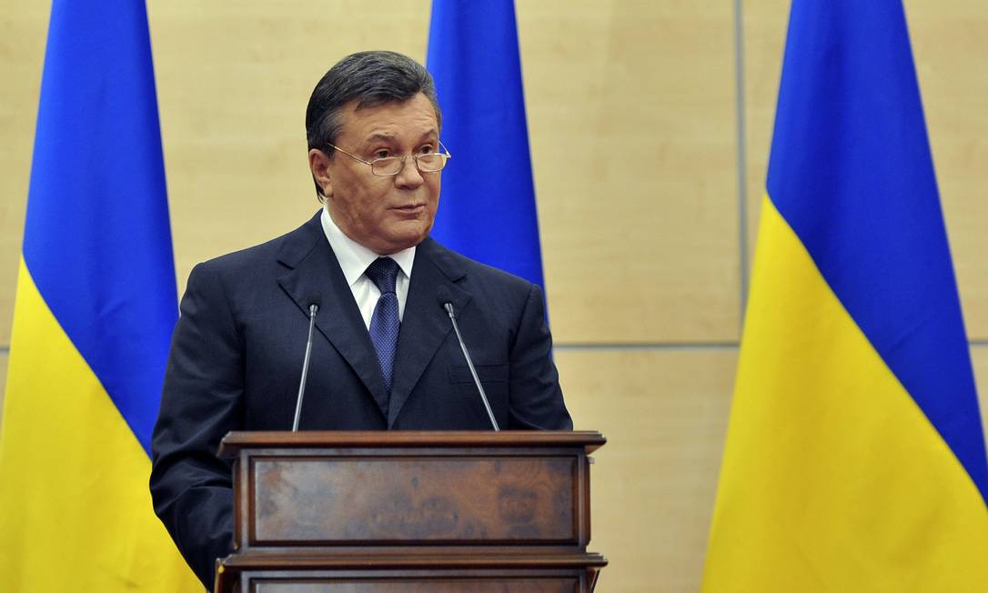 
Presidente deposto da Ucrânia, Viktor Yanukovych, em entrevista coletiva em Rostov-on-Don, na Rússia
Foto: Sergey Pivovarov / AP