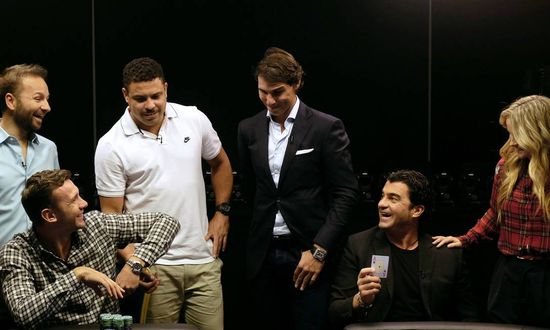 
Jogatina: Ronaldo e Nadal observam o jogo de pôquer
Foto:
DAVID W CERNY
/
REUTERS
