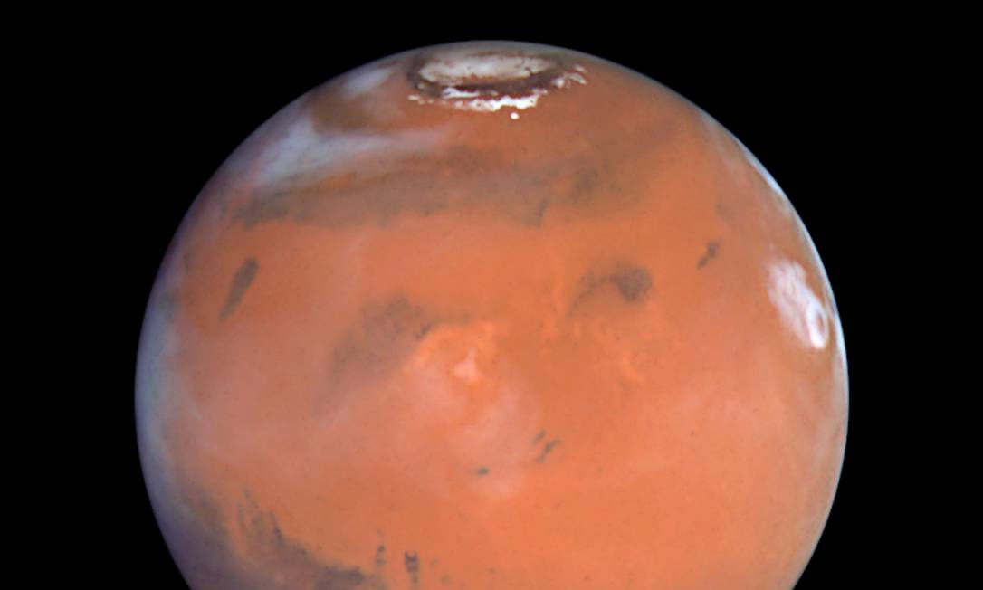 This 1999 Hubble telescope image shows Mars when Mars was 54 million miles (87 million kilometers) from Earth. A NASA spacecraft designed to investigate how Mars lost its water is expected to put itself into orbit around the Red Planet on Sunday after a 10-month journey. After traveling 442 million miles (711 million km) from Earth, the Mars Atmosphere and Volatile Evolution, or MAVEN, probe faces a do-or-die burn of its six braking rockets beginning at 9:37 p.m. EDT/0137 GMT. REUTERS/NASA/Handout (OUTER SPACE - Tags: ENVIRONMENT SCIENCE TECHNOLOGY) FOR EDITORIAL USE ONLY. NOT FOR SALE FOR MARKETING OR ADVERTISING CAMPAIGNS. THIS IMAGE HAS BEEN SUPPLIED BY A THIRD PARTY. IT IS DISTRIBUTED, EXACTLY AS RECEIVED BY REUTERS, AS A SERVICE TO CLIENTS Foto: NASA / REUTERS