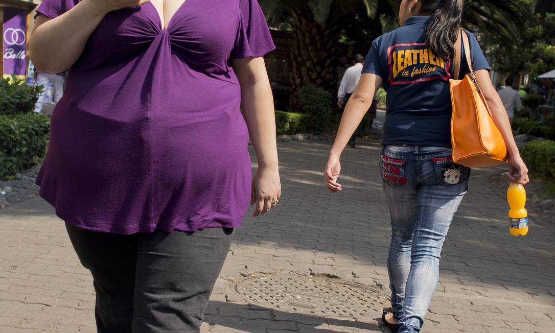 
Mulher obesa anda por rua na Cidade do México: novas descobertas sobre metabolismo de gorduras podem ajudar a combater excesso de peso e doenças a ele relacionadas, como o diabetes
Foto:
AFP/Ronaldo Schemidt
