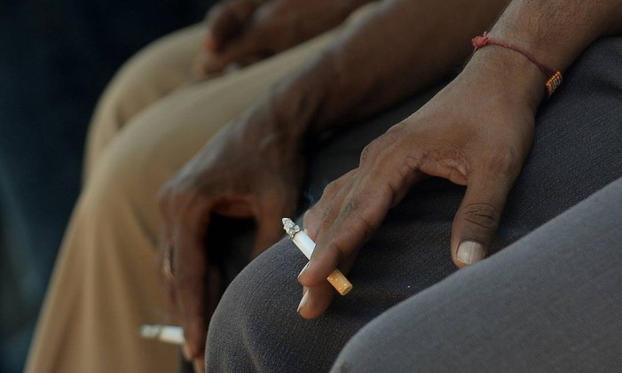 Cigarro Foto: Punit Paranjpe / AFP