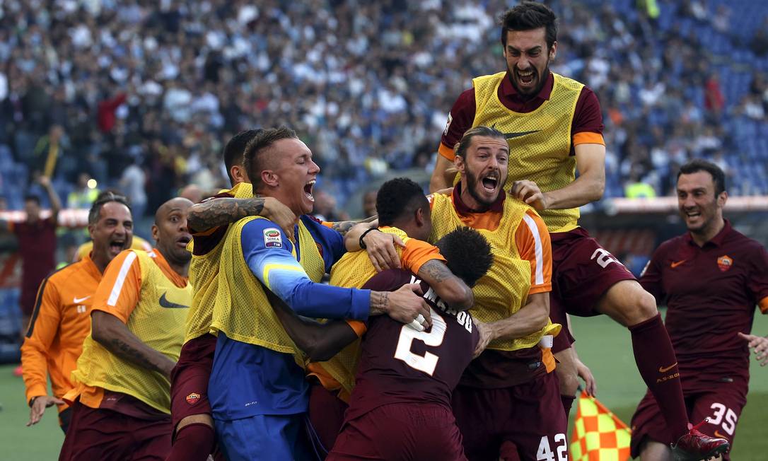 Lazio players cheer after scoring during the Italian Serie A