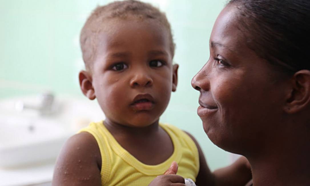 A mÃ£e Yunaisy teve um filho livre do vÃ­rus do HIV graÃ§as ao tratamento precoce Foto: PAHO/WHO/S. Oliel