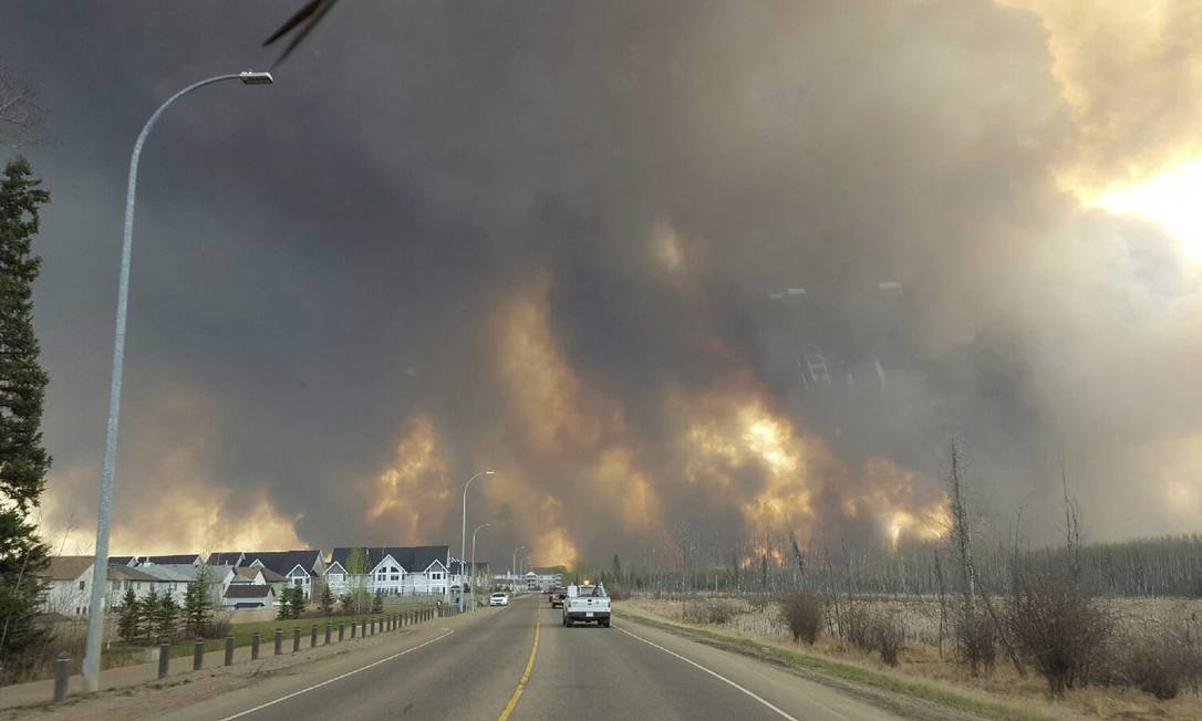 
Fumaça toma cidade de Fort McMurray, em Alberta
Foto:
Mary Anne Sexsmith-Segato
/
AP
