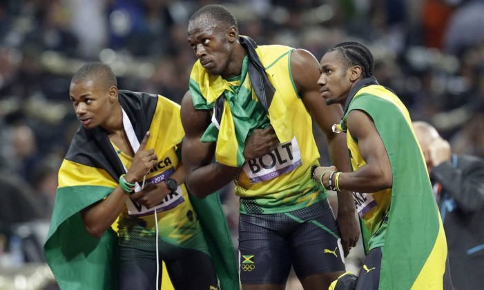Jamaica de Warren weir, Usain bolt e Yohan Blake busca terceiro ouro consecutivo no revezamento 4 x 100 metros Foto: Lee Jin-man / AP