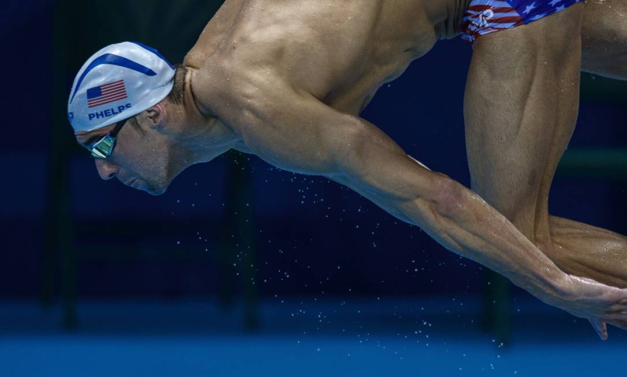 O nadador Michael Phelps, maior medalhista da história dos Jogos, vai representar os EUA Foto: Daniel Marenco / Agência O Globo