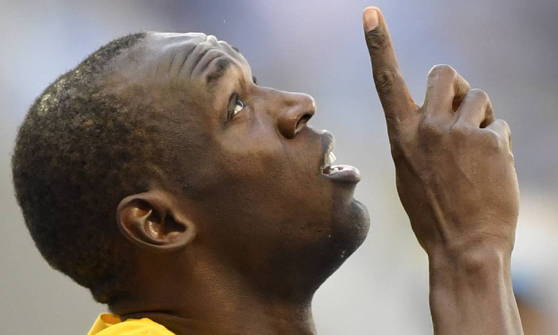 Usain Bolt, o maior nome do atletismo mundial, recordista dos 100m Foto: FABRICE COFFRINI / AFP