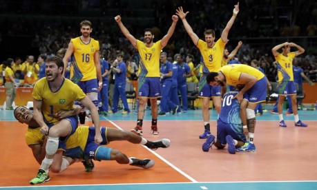 Jogadores comemora a vitória sobre a Itália Foto: Matt Rourke / AP