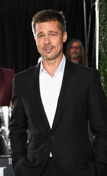 Pela primeira vez desde o fim do casamento com Angelina Jolie, anunciado em setembro, Brad Pitt deu as caras num tapete vermelho. Ator esteve na noite de quarta-feira na estreia de "Allied", em Hollywood Foto: Frazer Harrison / AFP