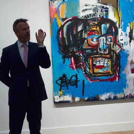 A obra de Basquiat atingiu valor recorde de US$ 110,5 milhões Foto: DON EMMERT / AFP