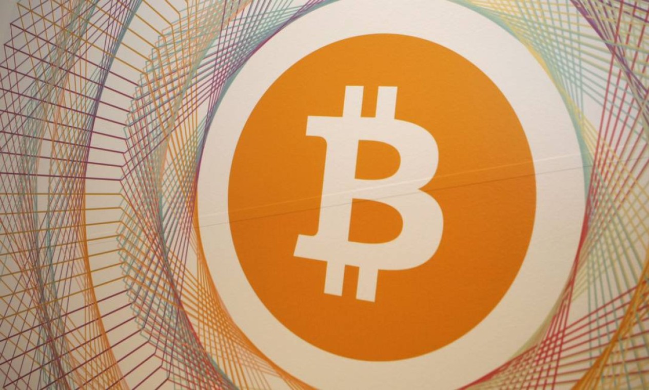 Corrida por bitcoin impulsiona outras criptomoedas - Jornal O Globo