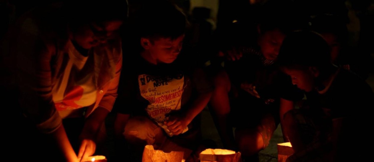 CrianÃ§as durante vigÃ­lia para marcar o Dia Internacional das VÃ­timas de Desaparecimentos ForÃ§ados, em Ciudad JuÃ¡rez, MÃ©xico Foto: JOSE LUIS GONZALEZ / REUTERS/30-8-2018