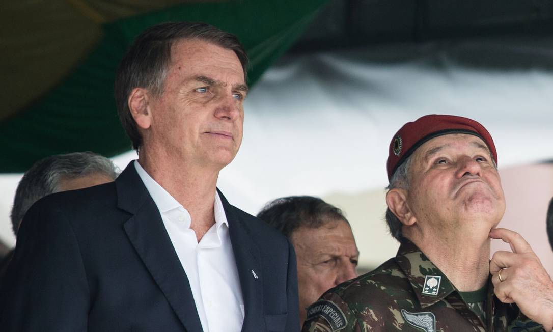 O presidente eleito Jair Bolsonaro durante cerimônia na Vila Militar Foto: FERNANDO SOUZA / AFP