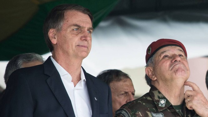 O presidente eleito Jair Bolsonaro durante cerimônia na Vila Militar Foto: FERNANDO SOUZA / AFP