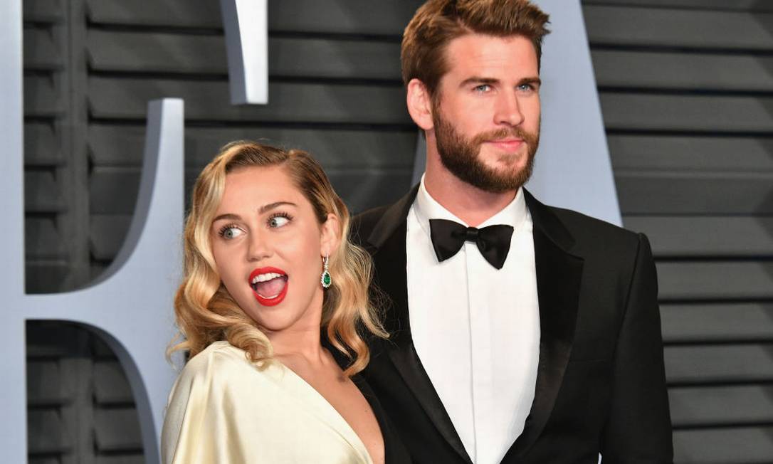Miley Cyrus e Liam Hemsworth em março de 2018 Foto: Dia Dipasupil / Getty Images