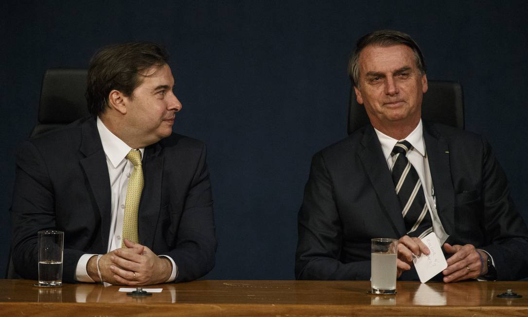 Rodrigo Maia e Jair Bolsonaro participam da posse de novos procuradores federais Foto: Daniel Marenco / Agência O Globo