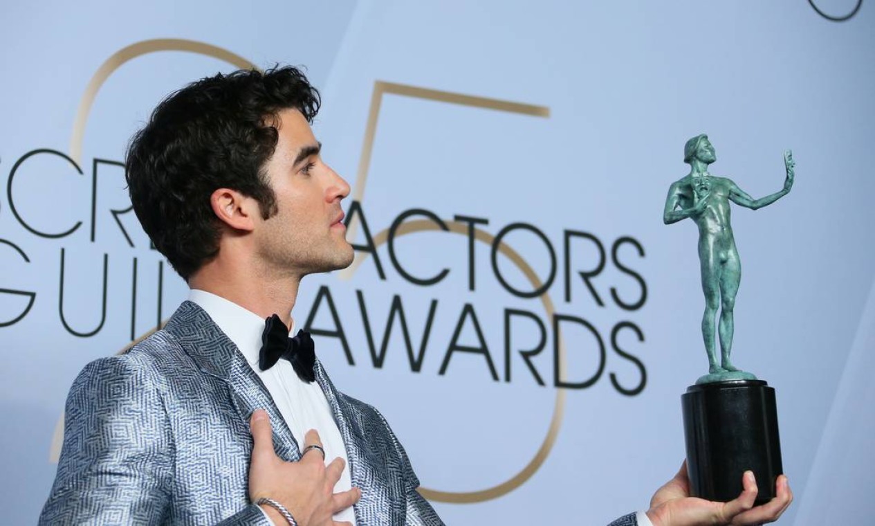 Darren Criss recebeu um SAG por sua interpretação como o serial killer Andrew Cunanan em 'O assassinato de Gianni Versace' Foto: JEAN-BAPTISTE LACROIX / AFP