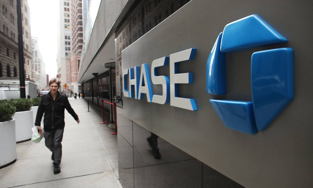 O JPMorgan Chase vai iniciar testes da blockchain com um pequeno número de clientes corporativos Foto: SPENCER PLATT / AFP