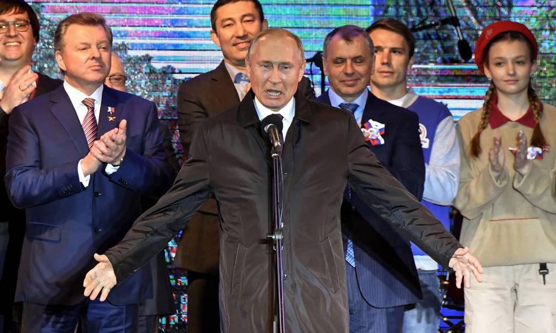 Presidente russo, Vladimir Putin, durante evento comemorativo do quinto aniversário da anexação da Crimeia, em Simferopol Foto: POOL / REUTERS