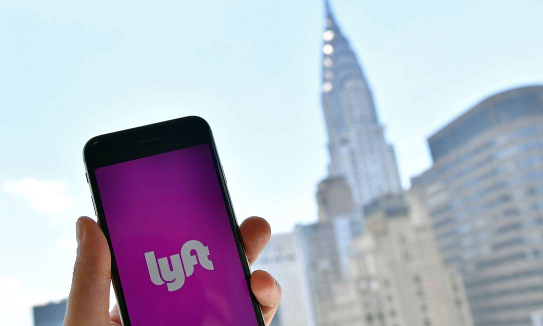 Lyft espera arrecadar US$ 2 bilhões com sua oferta inicial de ações. Foto: ANGELA WEISS / AFP