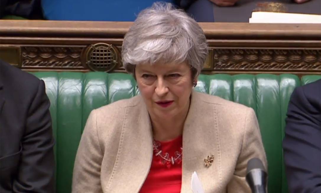 Primeira-ministra britânica, Theresa May acompanha 3ª votação do Parlamento sobre acordo do Brexit Foto: PRU / AFP