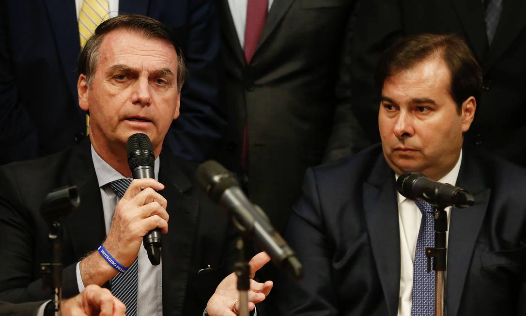 O presidente Jair Bolsonaro e o presidente da Câmara, Rodrigo Maia 20/03/2019 Foto: CAROLINA ANTUNES / AFP