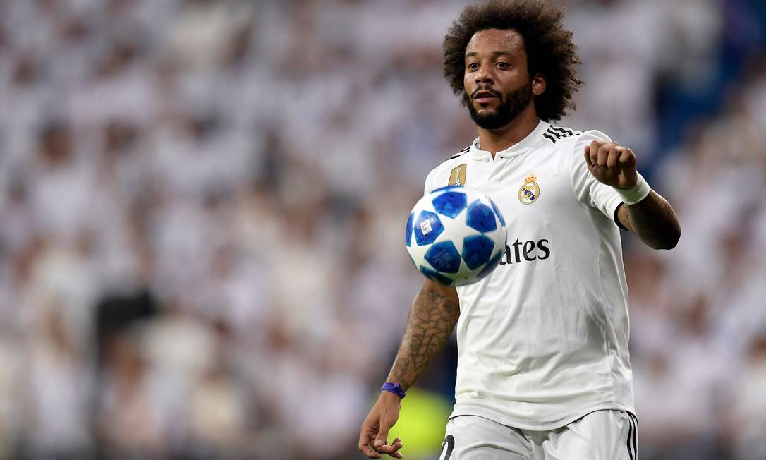 Marcelo é capitão do Real Madrid, clube que defende desde 2007. Ele é criador de uma escola de futebol de campo, de salão e de praia na Espanha Foto: Oscar Del Pozo / AFP
