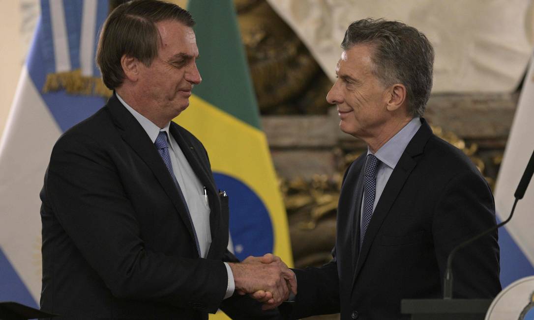 Jair Bolsonaro se encontrou com o presidente argentino Mauricio Macri: moeda única estaria em estudo, disse o presidente brasileiro Foto: JUAN MABROMATA/AFP/06-06-2019
