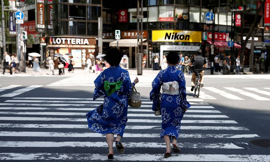 A carÃªncia de mÃ£o de obra no JapÃ£o vem do rÃ¡pido envelhecimento populacional. A previsÃ£o Ã© que a populaÃ§Ã£o atual de 127 milhÃµes se reduza para 86,7 milhÃµes em 2060 Foto: Kim Kyung Hoon/Reuters/20-7-2018 / REUTERS