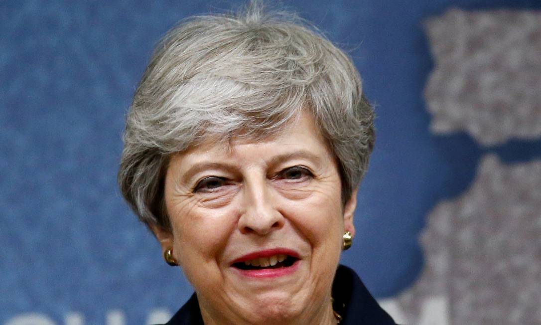 Primeira-ministra britânica, Theresa May, durante discurso em Londres Foto: HENRY NICHOLLS / AFP