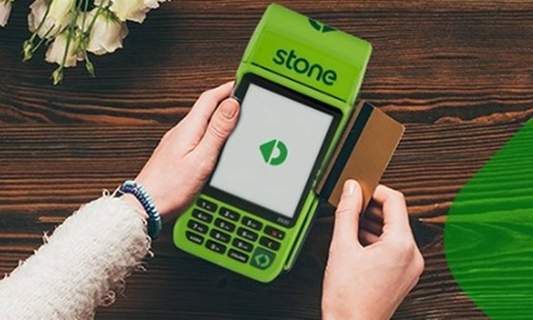 Máquina de pagamentos da Stone: parceria com Grupo Globo. Foto: Reprodução/Facebook Stone