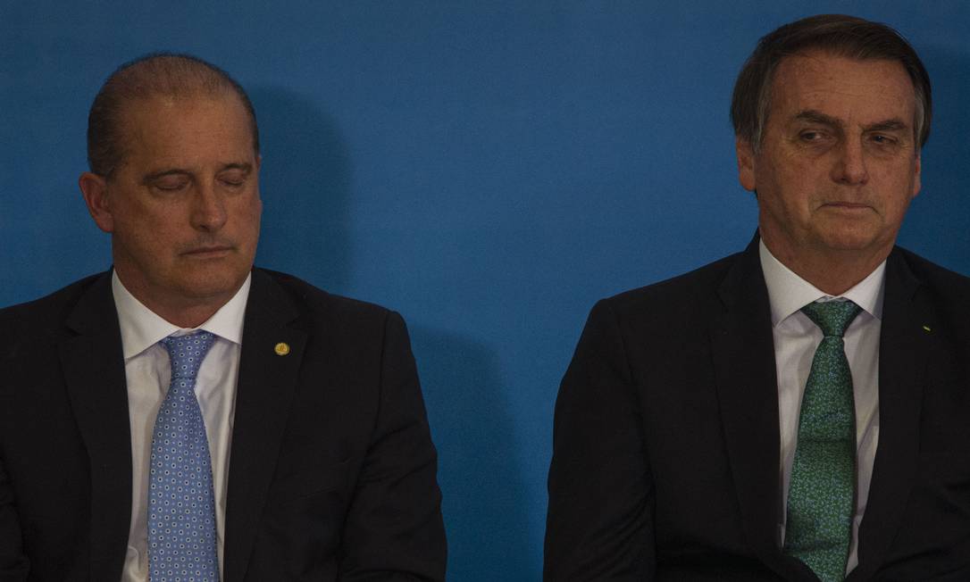 O ministro da Casa Civil, Onyx Lorenzoni e o presidente Jair Bolsonaro, em julho Foto: Daniel Marenco / Agência O Globo