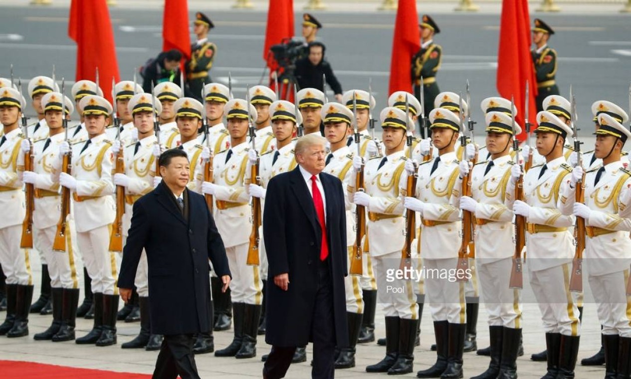 Os presidentes Donald Trump (EUA) e Xi Jinping (China) estão travando uma guerra comercial. Os EUA aumentaram tarifas para produtos chineses. Em contrapardida, os chineses suspenderam a compra de produtos agrícolas dos Estados Unidos Foto: Pool / Getty Images - 9/11/2017