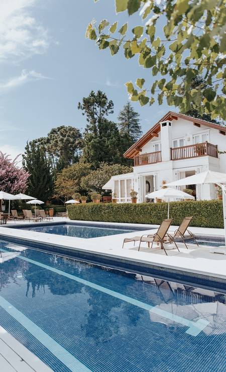 Piscina do Roots Resort, em Monte Verde, Minas Gerais Foto: Divulgação