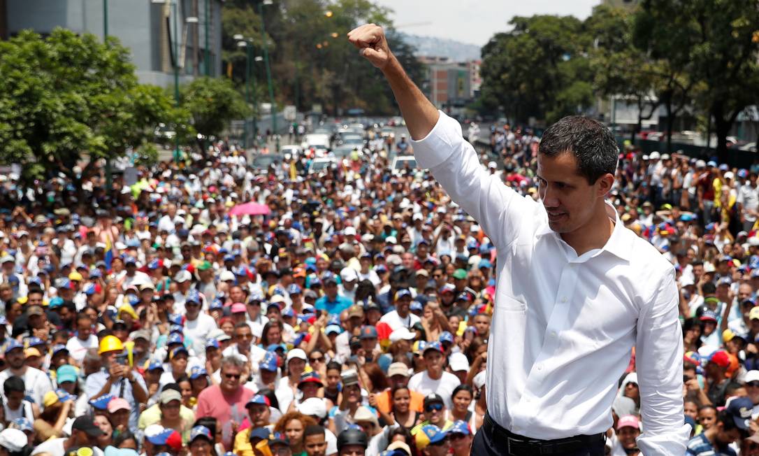 O líder opositor venezuelano Juan Guaidó durante protesto contra o governo do presidente Nicolás Maduro em maio deste ano: segundo ele, governo do chavista está financiando movimentos violentos e anarquistas em países como Equador e Chile Foto: Carlos Garcia Rawlins/Reuters/01-05-2019