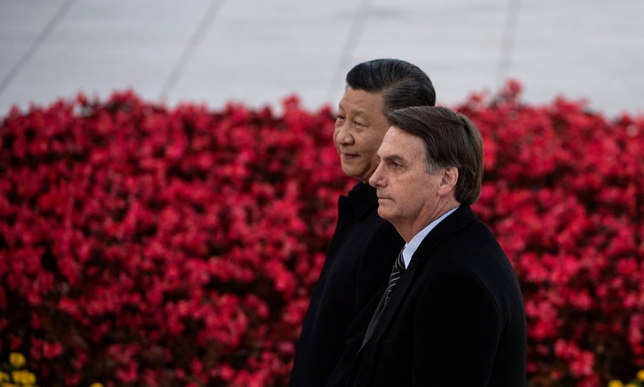 O presidente do Brasil, Jair Bolsonaro (direita), e o presidente da China, Xi Jinping, em Pequim, China Foto: NOEL CELIS / AFP