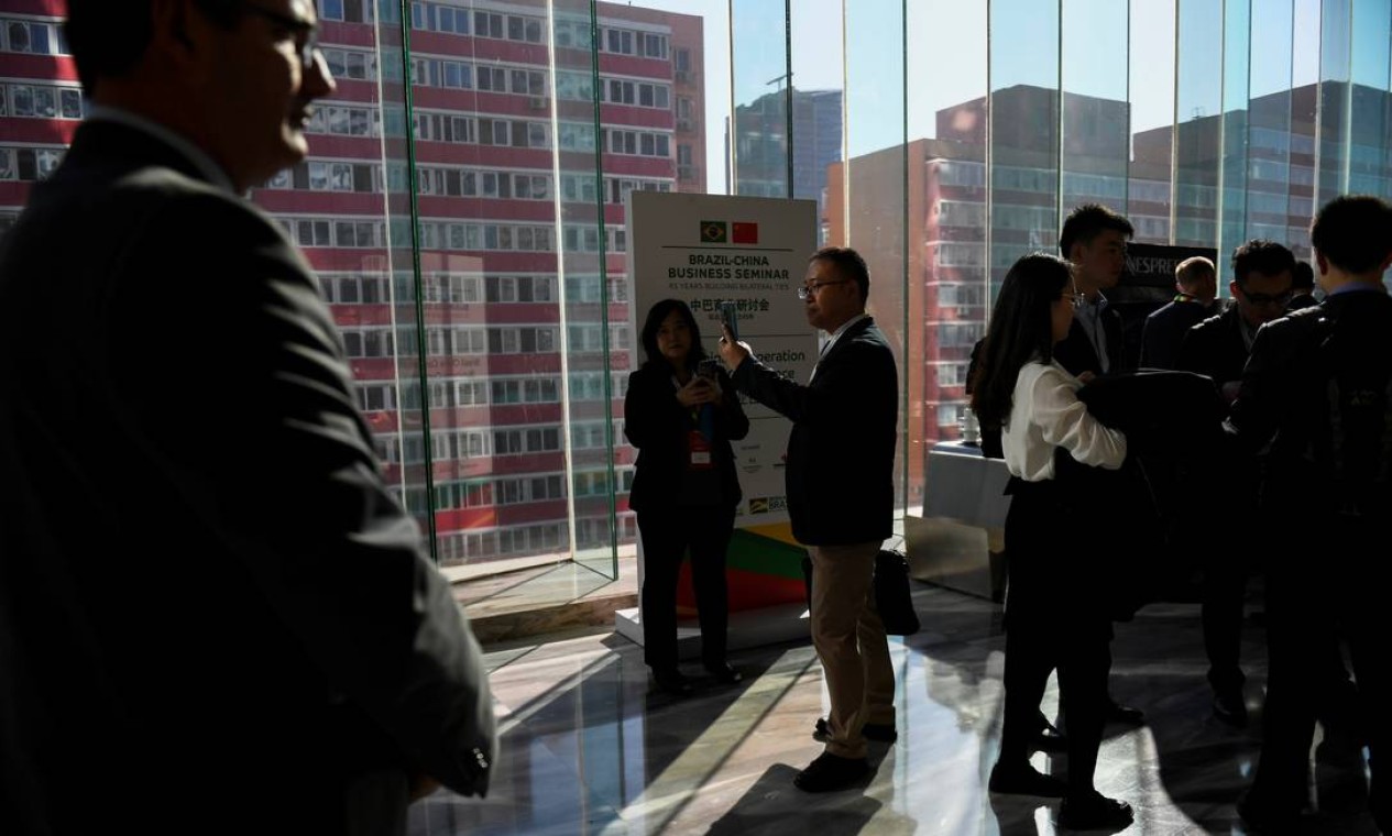 Participantes do Seminário de Negócios Brasil-China aguardam inicio do seminário Foto: POOL / REUTERS