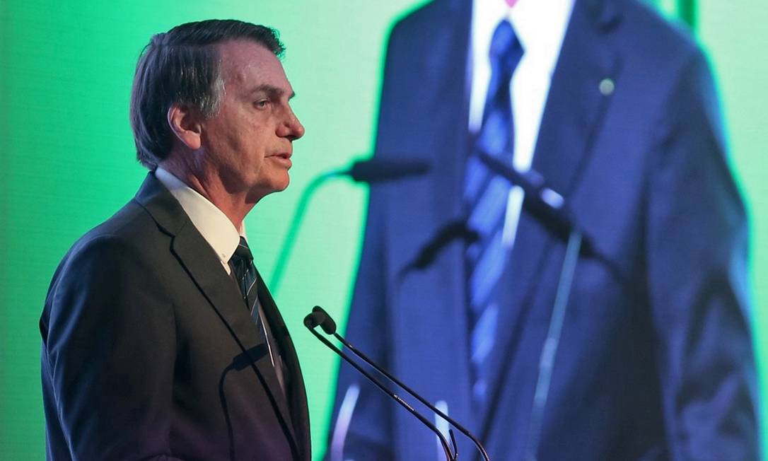 Presidente Jair Bolsonaro fala durante o Fórum de Negócios Brasil-Emirados Árabes, na capital dos Emirados, Abu Dhabi. Foto: - / AFP