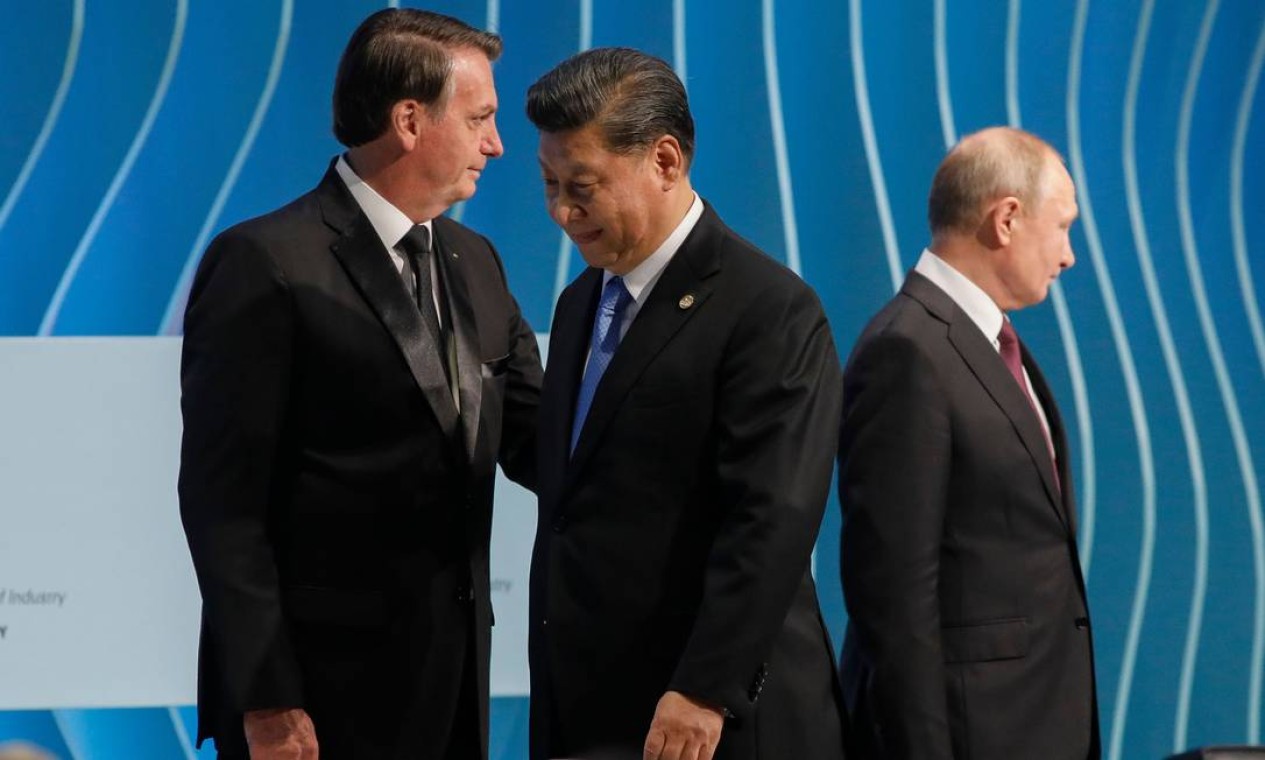 O presidente do Brasil, Jair Bolsonaro, o presidente da Rússia, Vladimir Putin, e o presidente da China, Xi Jinping, participam da 11ª edição da Cúpula do BRICS, em Brasília Foto: SERGIO LIMA / AFP
