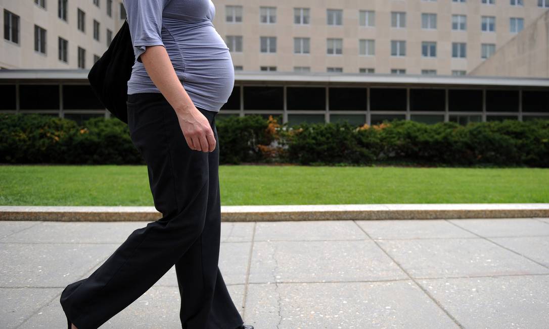 Mulher grávida vista em Washington Foto: TIM SLOAN / AFP/05-08-2010