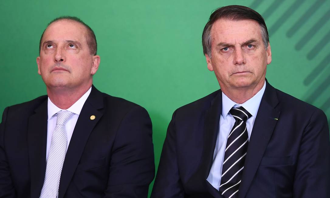 Presidente Jair Bolsonaro e o ministro da Casa Civil, Onyx Lorenzoni Foto: EVARISTO SA / AFP