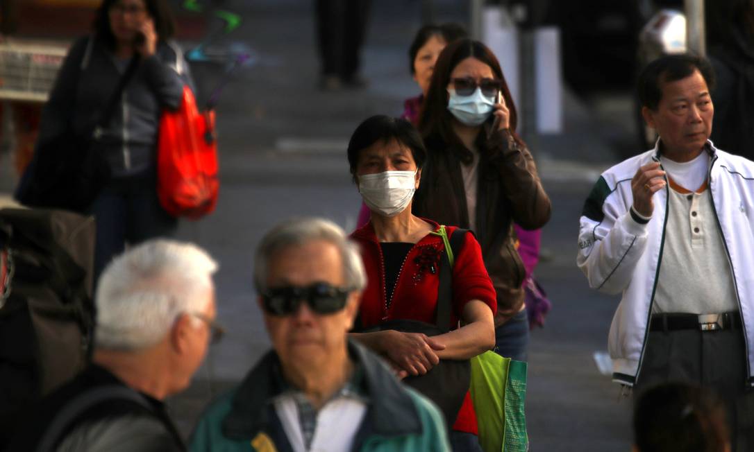 Nos EUA, moradores de San Francisco já usam máscaras Foto: JUSTIN SULLIVAN/AFP / AFP